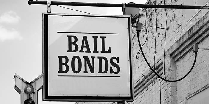 Hanging sign says "BAIL BONDS"