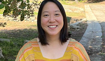 Photograph of Karen Law smiling at the camera