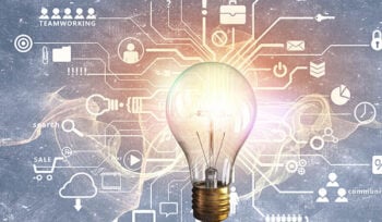 Illustration shows a glowing glass bulb with many shapes around it, including a key, various charts, email, silhouettes, and more.